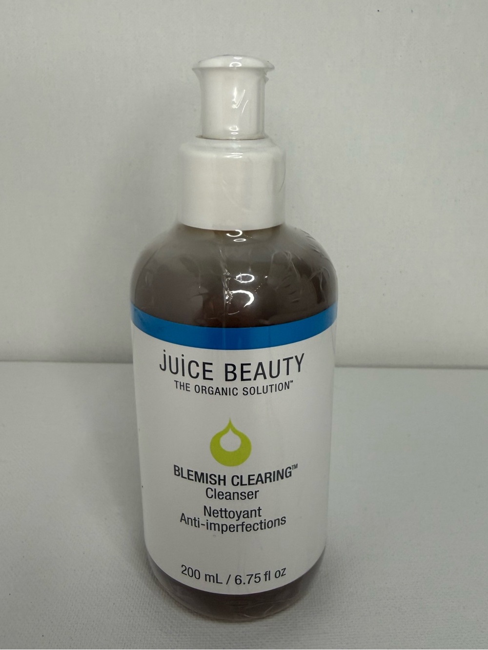 Juice Beauty White Bottle with Blue and Green Accent Blemish Cleanser
